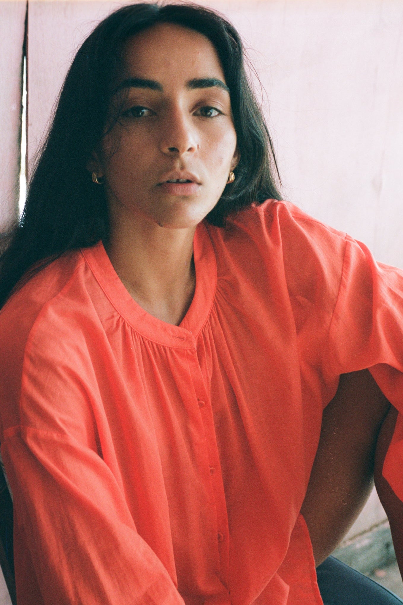 Close up of LILLY PILLY woman wearing a spritz Ember cotton voile shirt