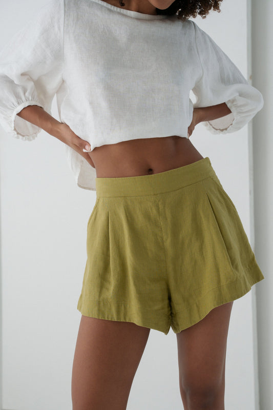 LILLY PILLY Gaia linen shorts in Olive green front close up view